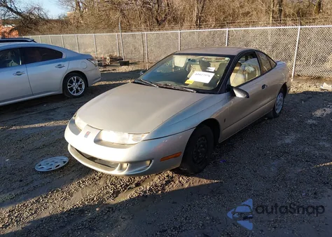 1999 Saturn Sc1 z USA, uszkodzony, nr VIN 1G8ZP1289XZ366065